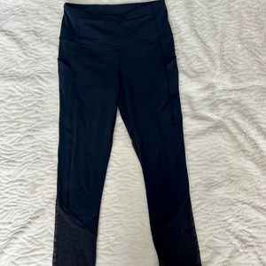 Lululemon Solid Black Luxtreme Mesh Crop Pocket Leggings. Size 4.
